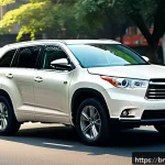 Home 23 토요타 하이랜더 하이브리드와 닛산 패스파인더 비교 - A sleek and modern Toyota Highlander Hybrid parked on a city street during daytime, showcasing its e...